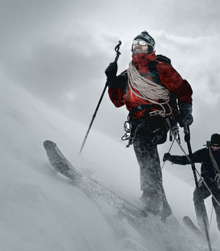 Climbing Mountain in Snow